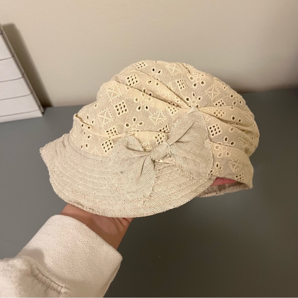 White cap with fabric bow